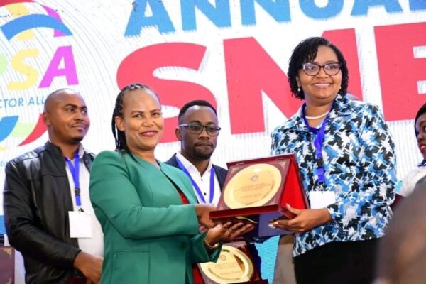 Receiving an award from the KEPSA CEO for role played in supporting their member entrepreneurs